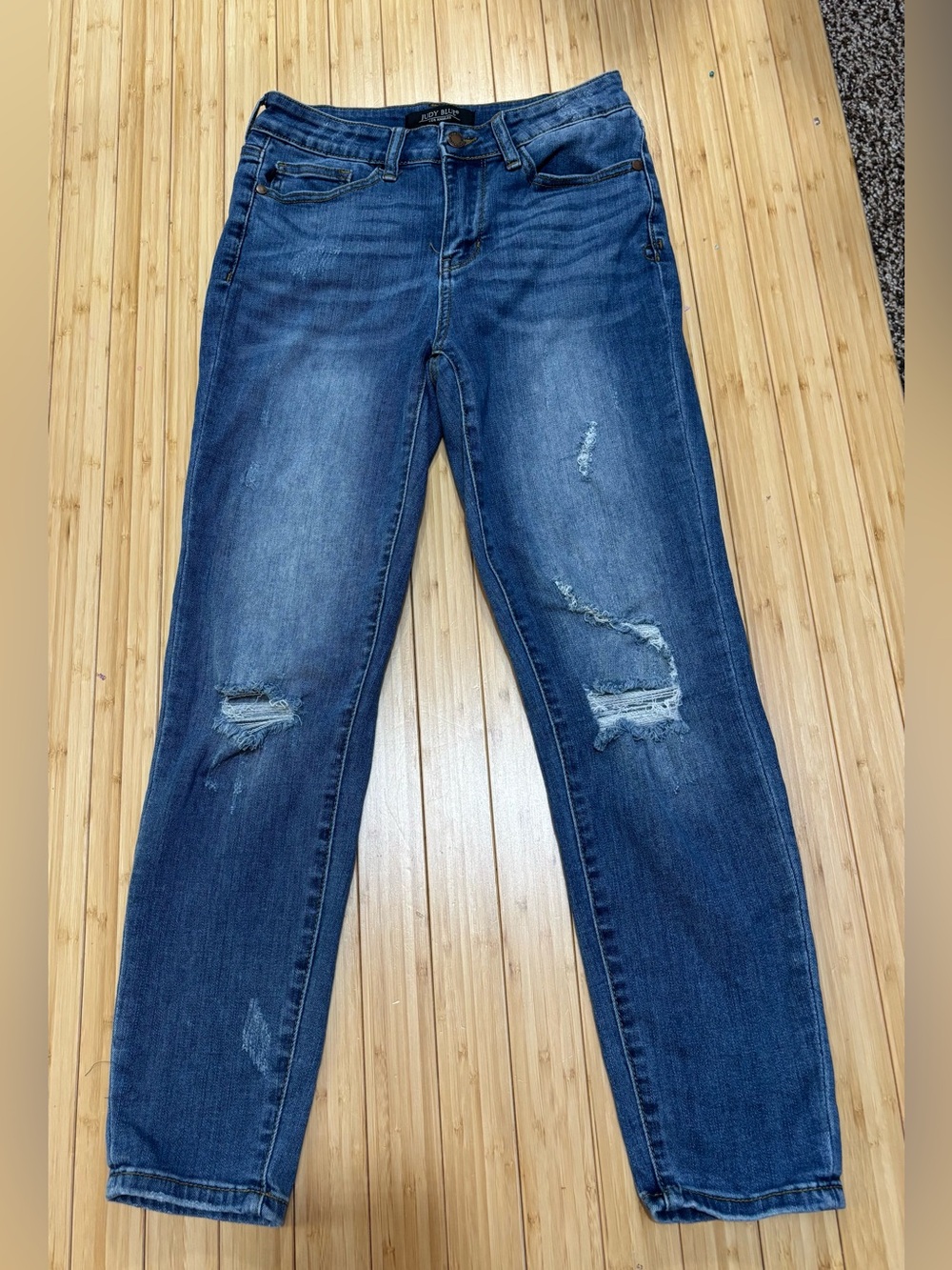 Judy Blue relaxed fit straight leg distressed jeans. Size 28. Medium wash.